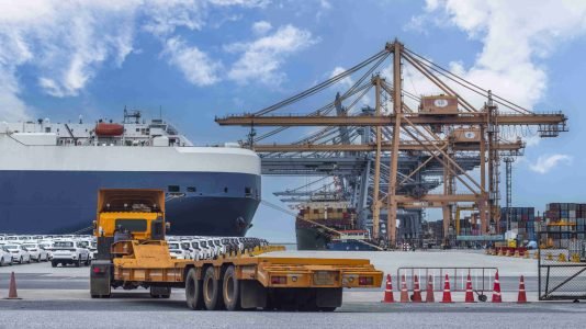 logistics-container-dock-cargo-yard-with-working-c-2024-11-13-19-58-41-utc (1)